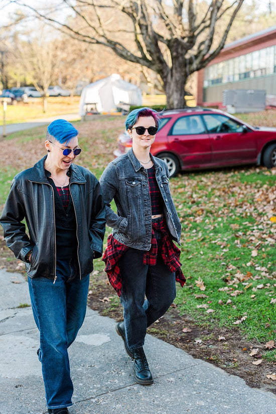 A Plaid chest binder in Punk Plaid modeled by Kendall and Layton
