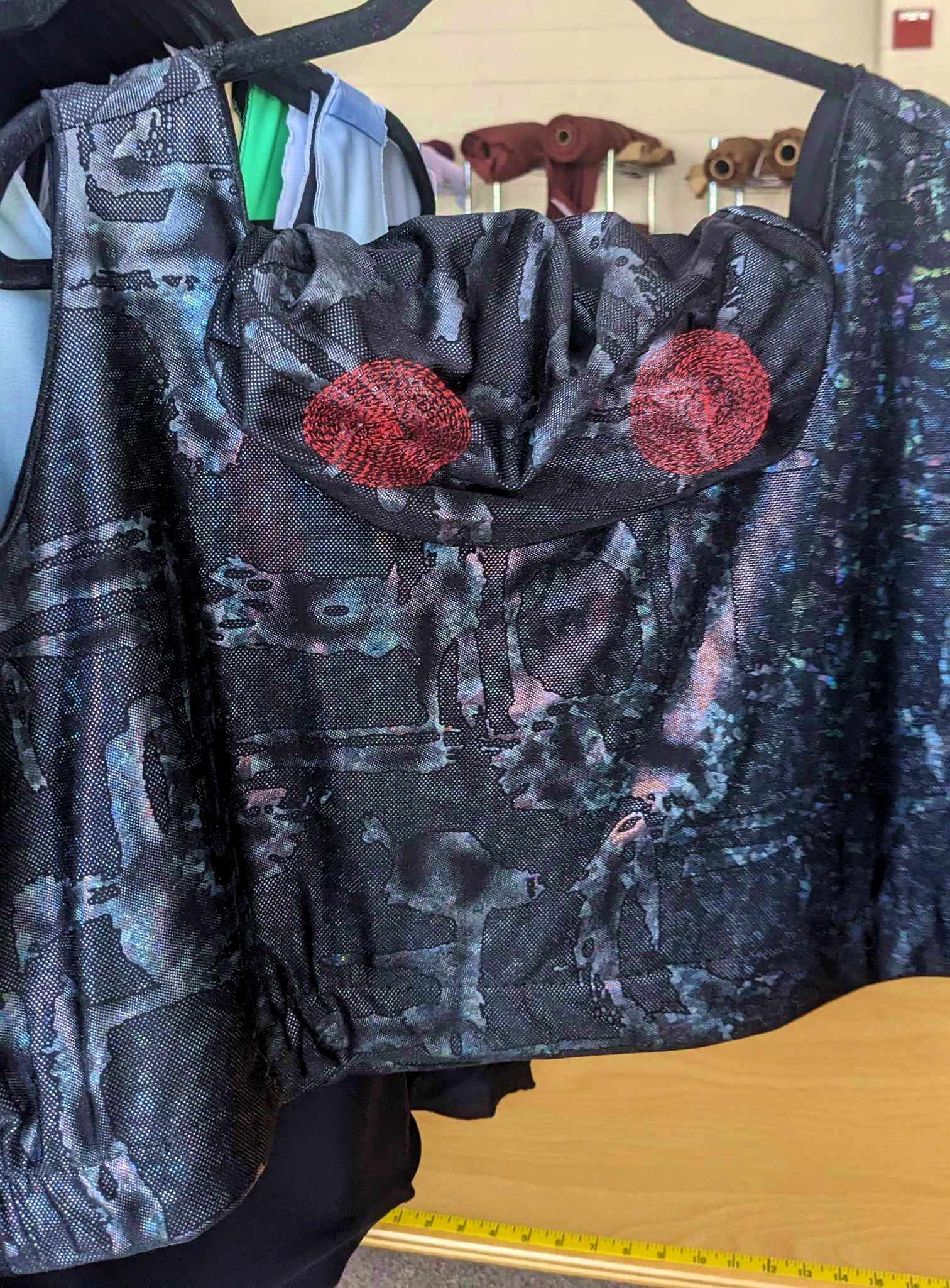 Mothman hooded sports bra with red eyes